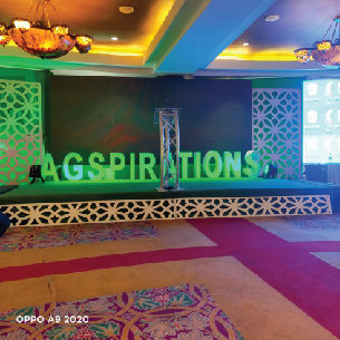 Stage with a branded LED wall and green lighting