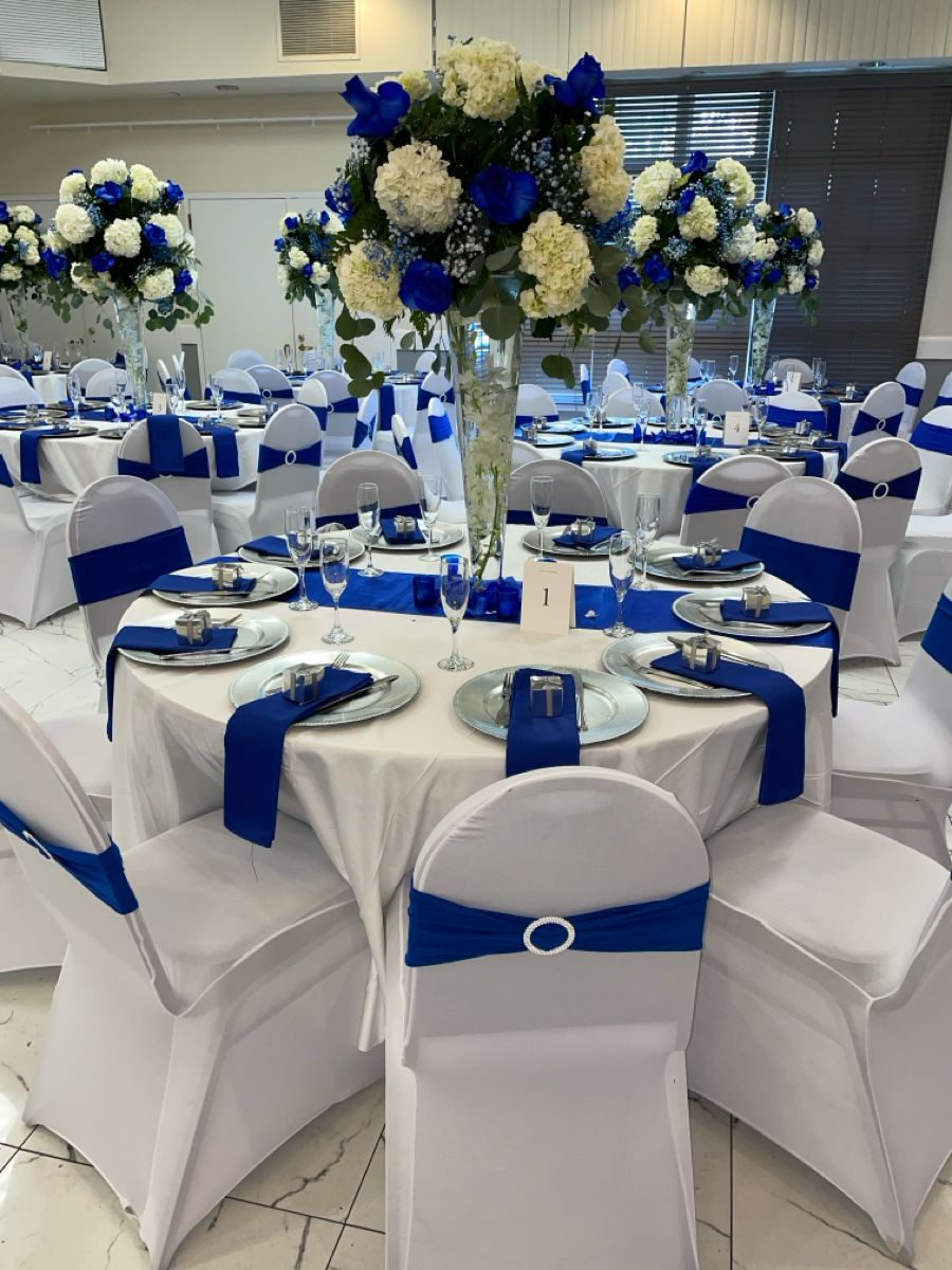 Banquet tables dressed in blue and white